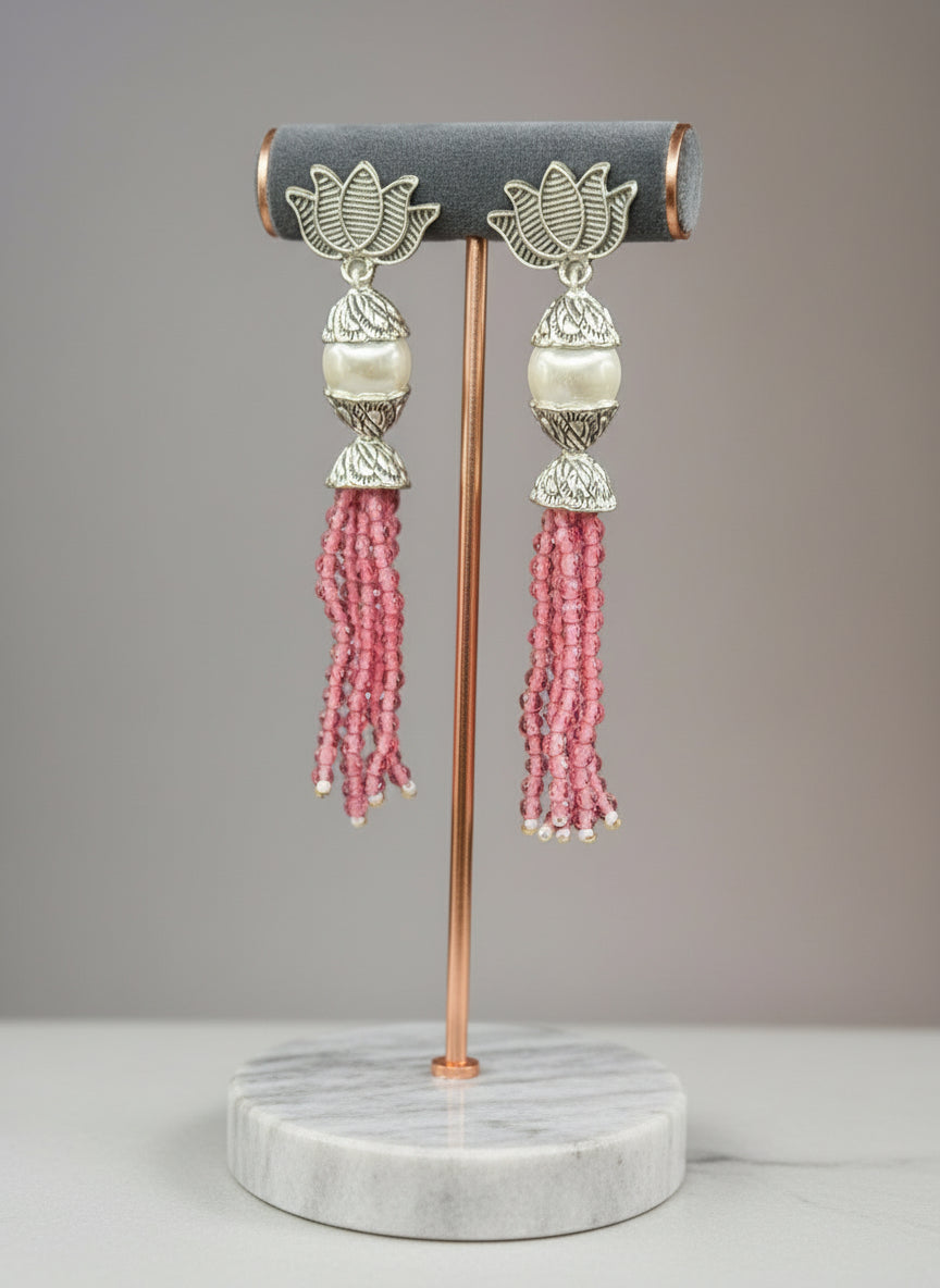 Earrings with Lotus flower stud than white pearl and than pink colour glass beads multi layers in hanging design. 