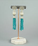 Earrings with Lotus flower stud than white pearl and than sky blue colour glass beads multi layers in hanging design. 
