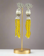 Earrings with Lotus flower stud than white pearl and than yellow colour glass beads multi layers in hanging design. 