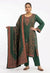 Model wearing a premium deep green pure silk kurta set featuring intricate Kanni embroidery and zari work paired with matching raw silk trousers