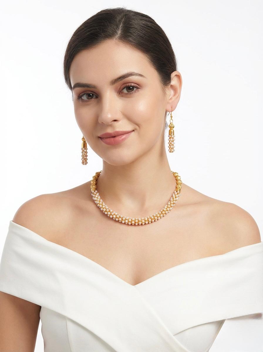  Elegant model wearing the gold-plated brass nano pearl choker and matching earrings.