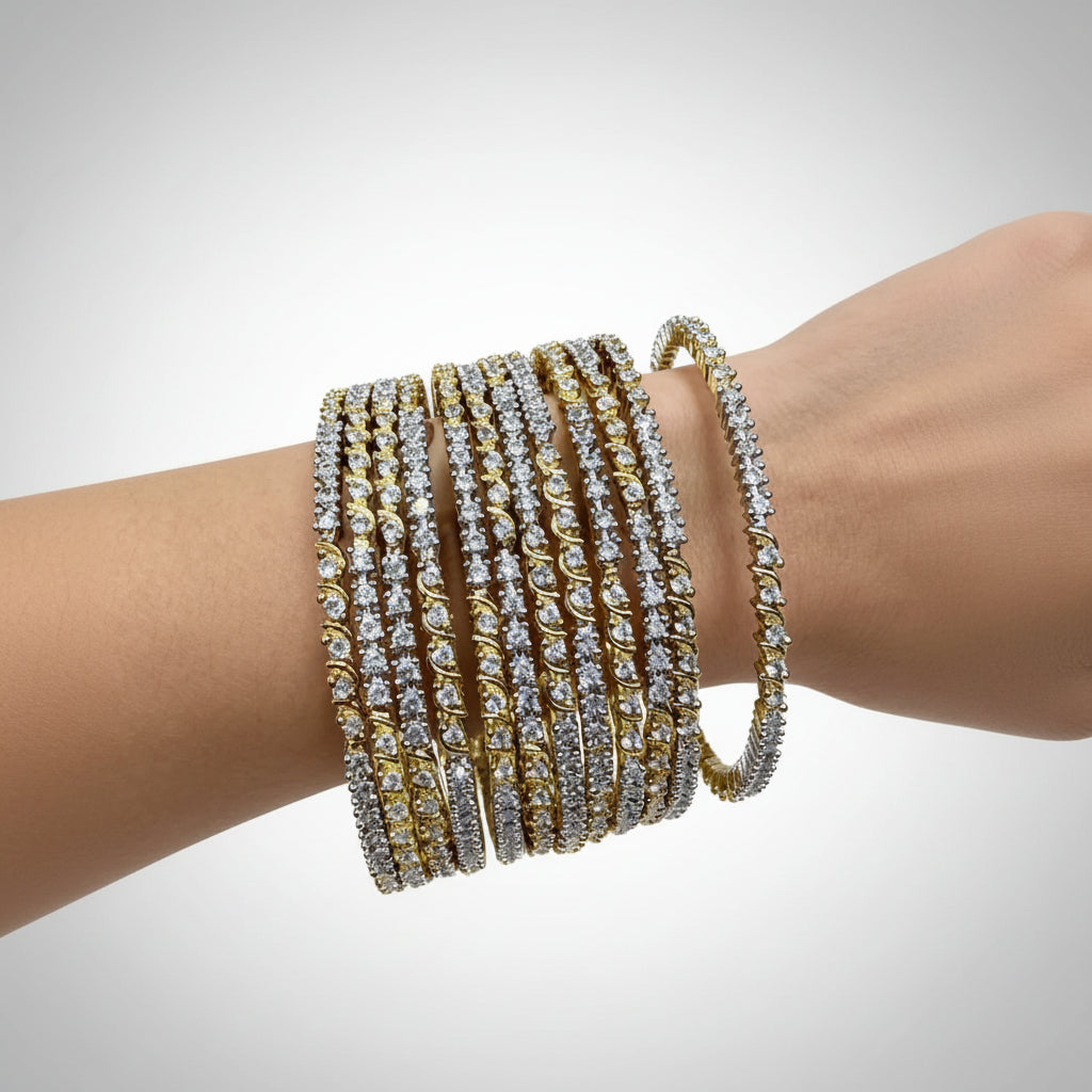 A model wearing a stack of twisted rope-style dual-tone bangles, featuring brilliant American Diamonds set in a gold and silver fusion finish.
