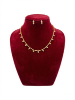  Exclusive one-of-a-kind Rose Gold Minakari necklace and stud earrings set displayed on a white luxury jewellery stand.