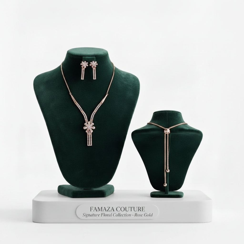 A luxury jewelry set from Famaza Couture featuring a dainty floral zircon necklace and matching floral stud earrings, presented on a dark velvet stand in a rose gold finish.