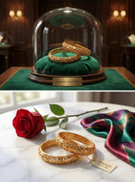 A pair of Famaza Couture micro-gold floral bangles displayed on a green velvet cushion under a luxury glass dome.