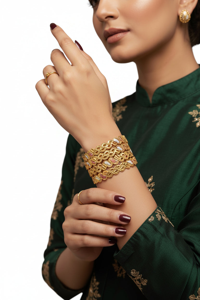 Model wearing a stack of four Famaza Couture gold, silver, and rose gold-plated interlocking wave bangles with a green embroidered outfit.