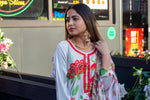 Woman wearing Anamta printed silk dress