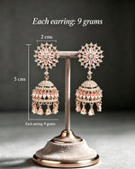 FC Rose Gold Pastel Pink Floral CZ Jhumka Earrings displayed with size dimensions (5 cm drop, 2 cm width) and weight specifications.