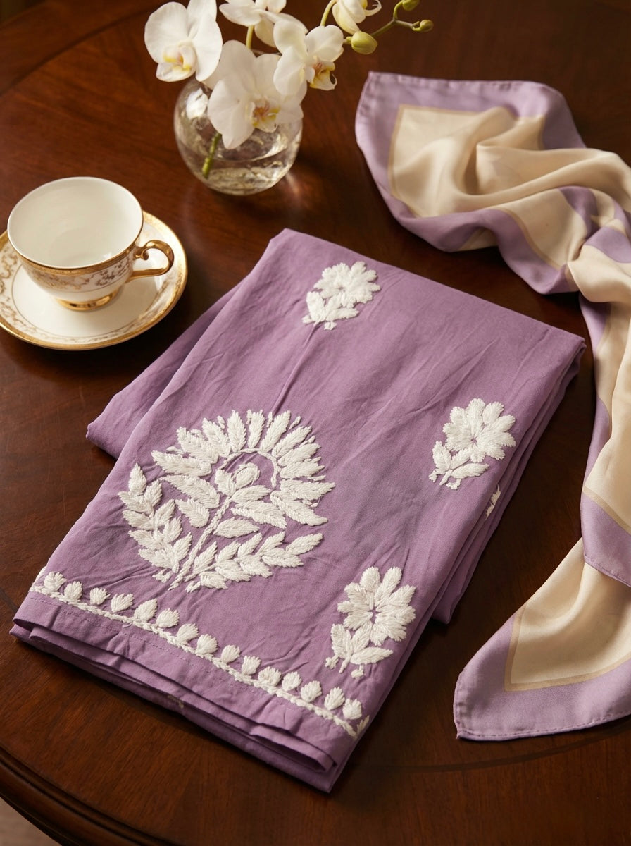 Folded purple trouser with white leaf pattern 