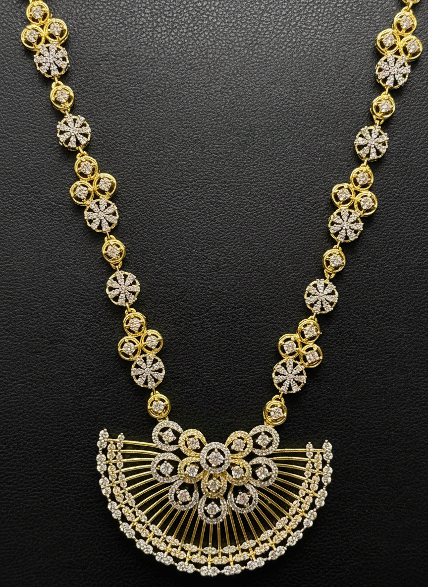 Gold and diamond necklace on a black background