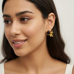 Gold earrings with black stones 