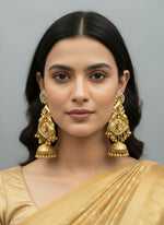 Gold plated long earrings by Famaza Couture 