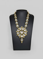 Gold tone kundan pear drop necklace pendant is focus by famaza couture 