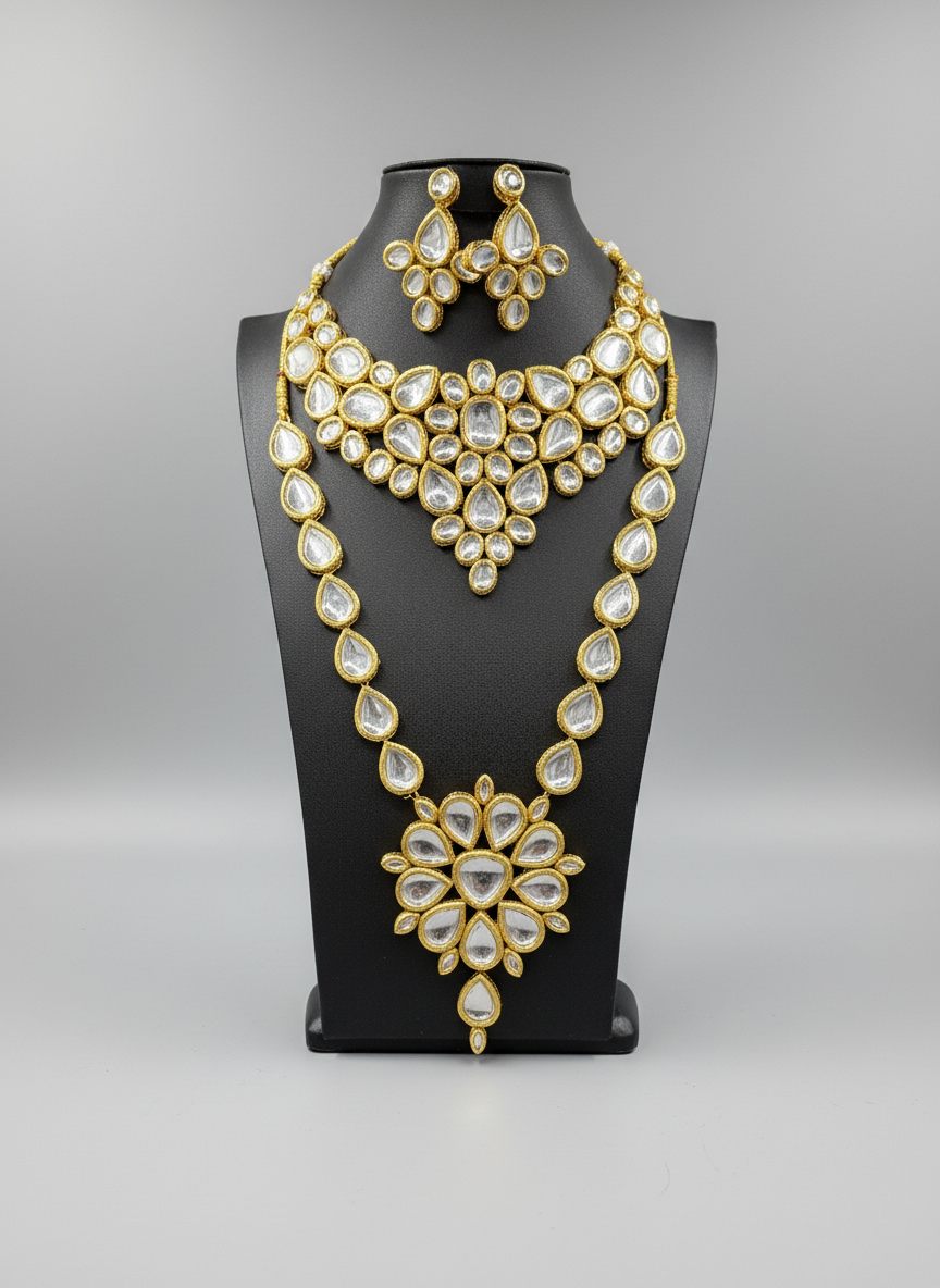 Gold toned kundan chocker necklace and long mala with earrings by famaza couture 