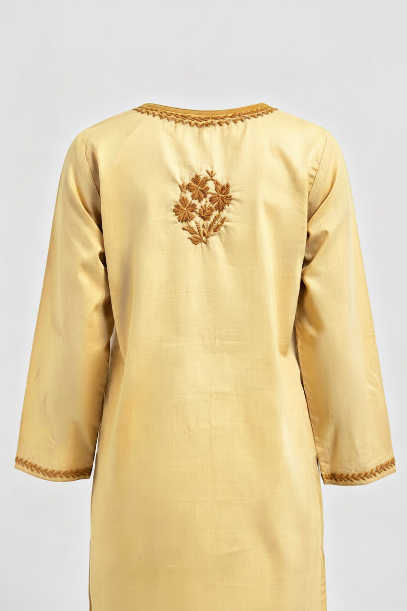 Back view of a light yellow short kurti featuring golden embroidery on the upper back neckline and a floral motif centered on the back.