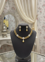 Golden floral choker necklace with white semi-precious stones and matching earrings - Famaza Couture.