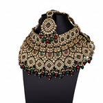 Grand golden bridal choker necklace with multicolor stonework and red and green bead droplets.