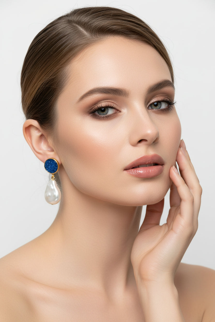  Handcrafted Mother of Pearl drop earrings with shimmering sugar stone studs in gold-tone brass, perfect for bridal jewellery and wedding guest attire.