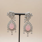 Intricate American Diamond setting with a mix of marquise and round stones surrounding a central pink sugar stone.