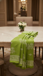 Lemon yellow,watermelon pink,grey,green,peach,purple,yellow,pink,lavender cotton sarees are displayed by famaza couture 