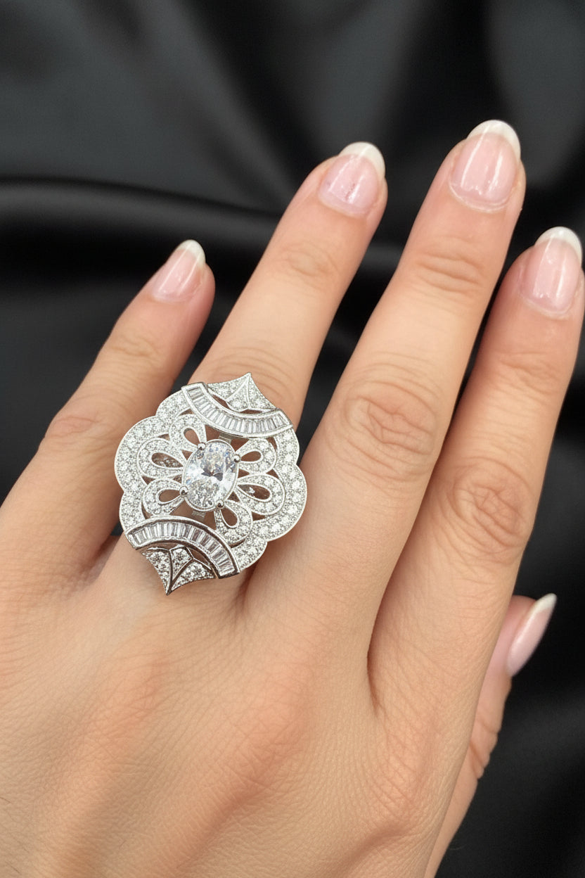  Luxury marquise-shaped adjustable cocktail ring featuring a brilliant white gem and floral accents.