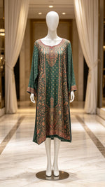 Mannequin wearing a bottle green kanni silk kurti with it's full elegance and royal elegance details. 