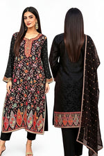 Front and back view of a premium black pure silk kurta set, showcasing detailed multi-colored Kanni floral embroidery, zari border work, and a matching embellished dupatta against a pure white background.