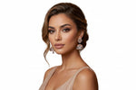 Model is displaying the rose gold small jhumka with back and rose gold stones.