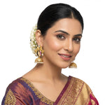 Model is wearing Thani Bani inspired earrings. 