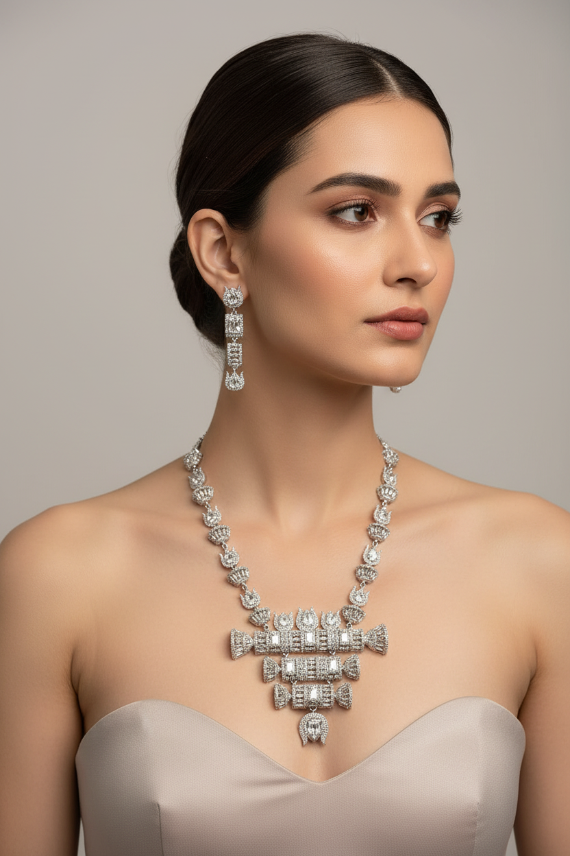 Model is wearing The American diamonds with white cubic zirconia centre stones hasli necklace and earrings jewellery set