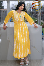 Model is wearing Yellow chikankari hand embroidered Aanarkali long dress 