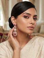 Model is wearing ruby pink American diamond earrings. 