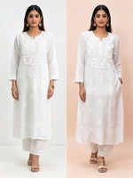 Model is wearing this 2pc white modal chikankari dress 