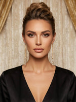 Model showcasing the dramatic 10cm shoulder-dusting length of the Celestial AD white stone statement earrings.