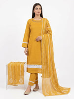 Mustard yellow Kota Doriya kurta set worn by a model, featuring intricate white lace details on the neck, sleeves, and hem, paired with matching pintuck straight trousers and an elegant dupatta.