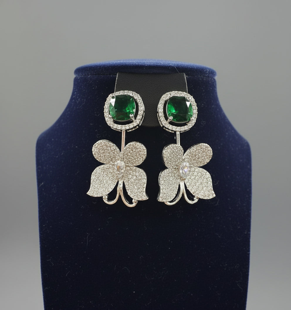 Nano American diamonds and emerald green central stone earrings by famaza couture 