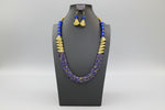 Necklace and earrings with blue and gold beads 