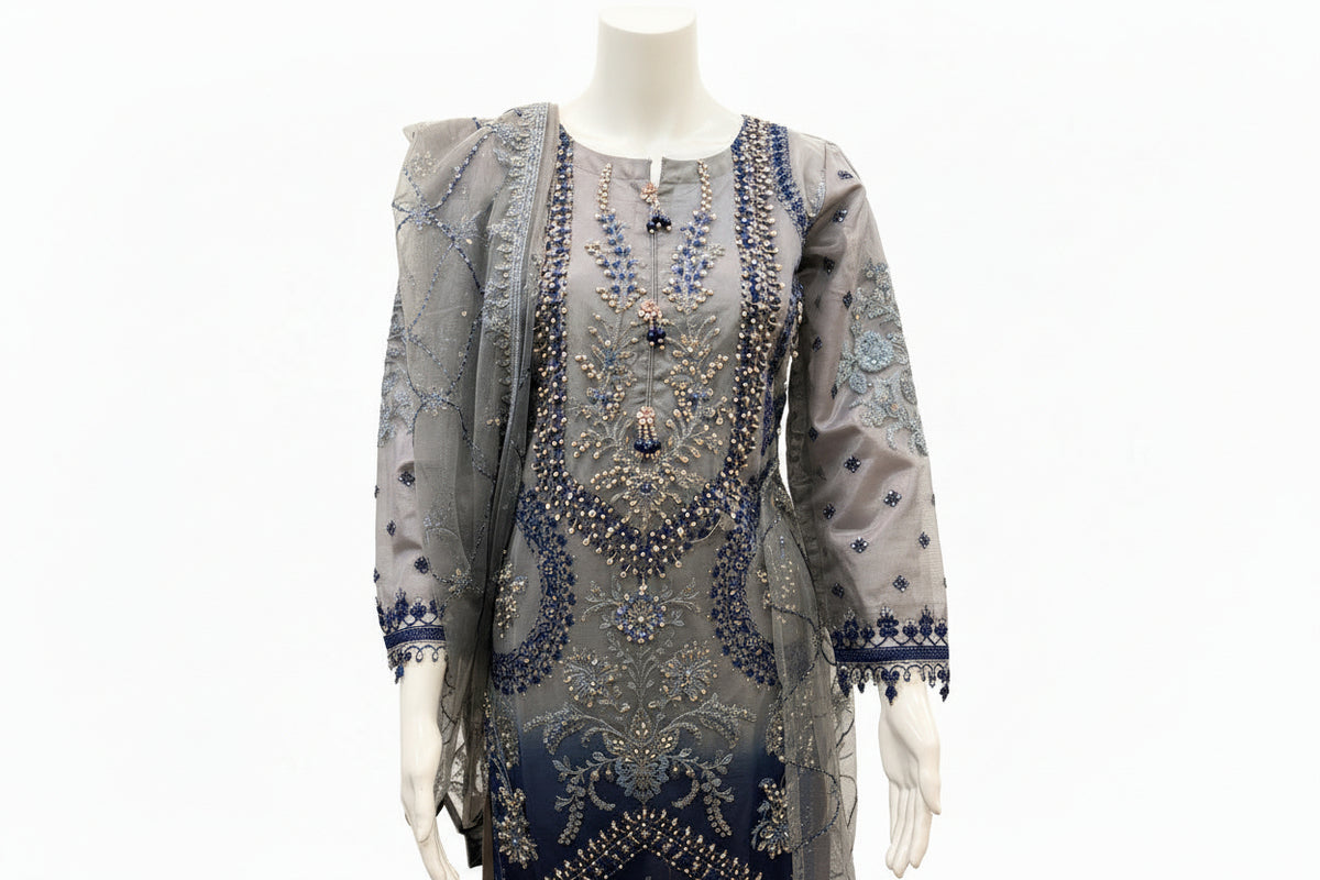 Net fabric in grey and navy blue two tone 3pcs Pakistani dress with hand embellishments on all over kurti and dupatta with plain grey silk straight trousers 