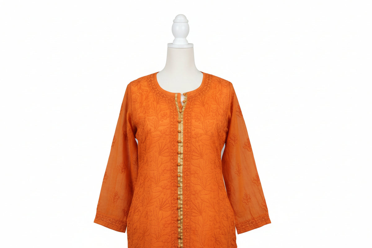 Orangehand embroidered kurti chest and sleeves are focused to show the authentic embroidery