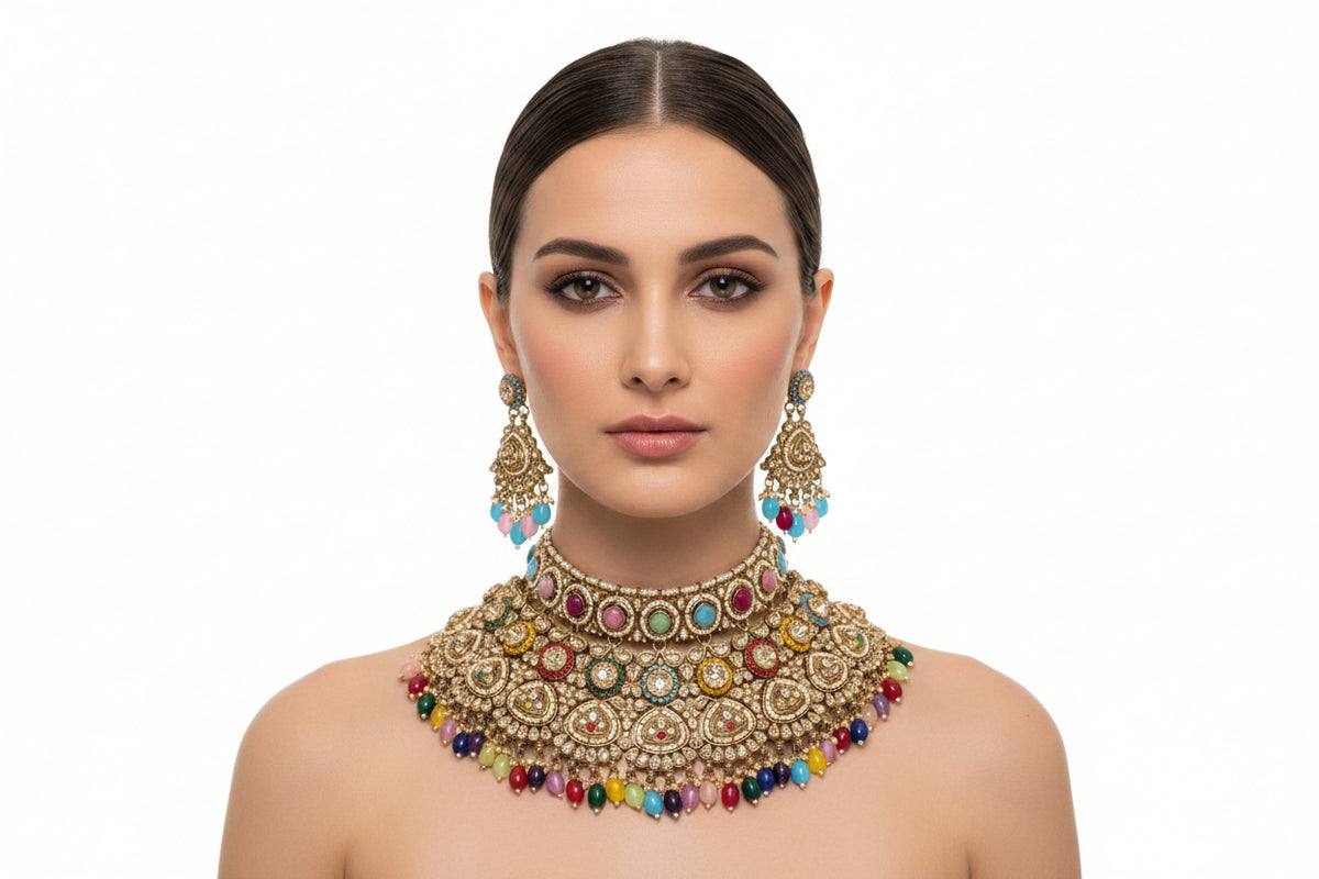 Ornate jewellery set with colourful gemstones on a black stand