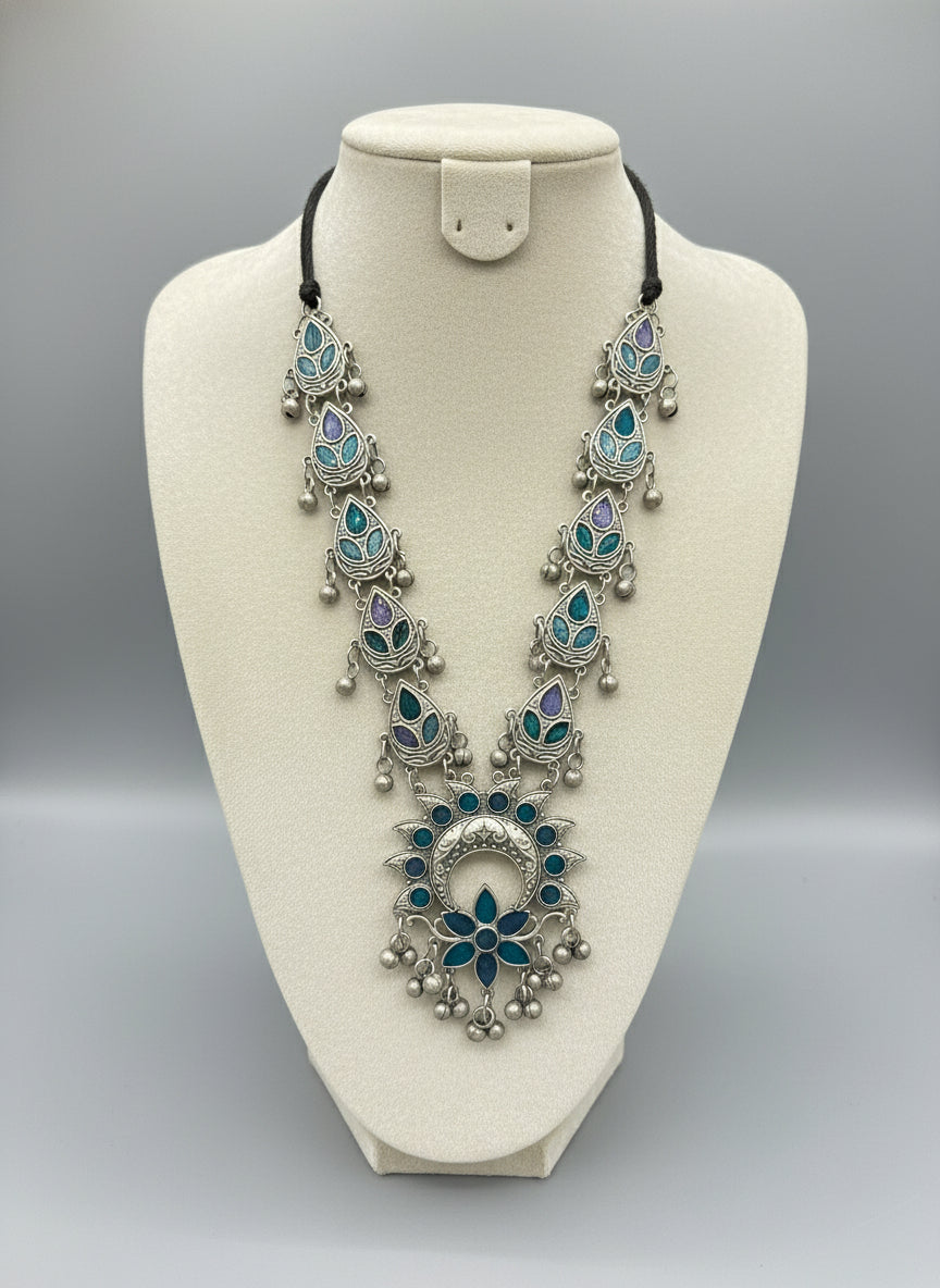 Oxidised long necklace with teal and purple paint on the leaf designs