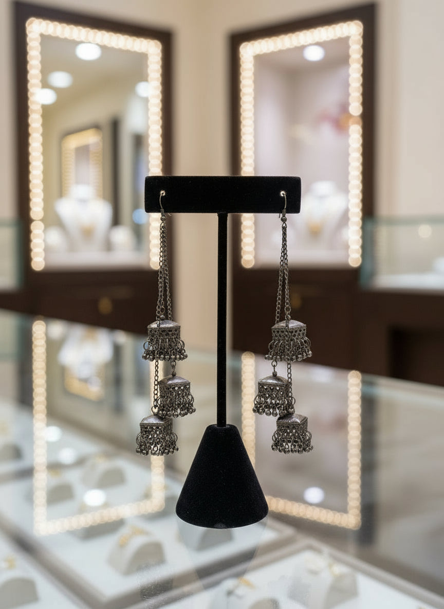 Pair of black chain earrings by famaza couture 