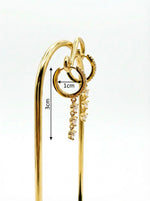 Pair of gold-plated hoop earrings featuring a sparkling dangling chain of crystals with measurments.
