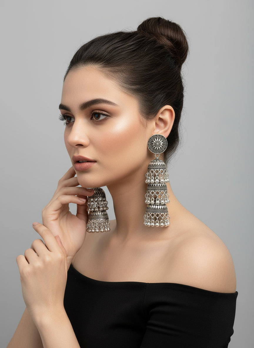 Model wearing silver oxidised jhumka earrings – ethnic jewellery