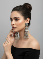 Model wearing silver oxidised jhumka earrings – ethnic jewellery