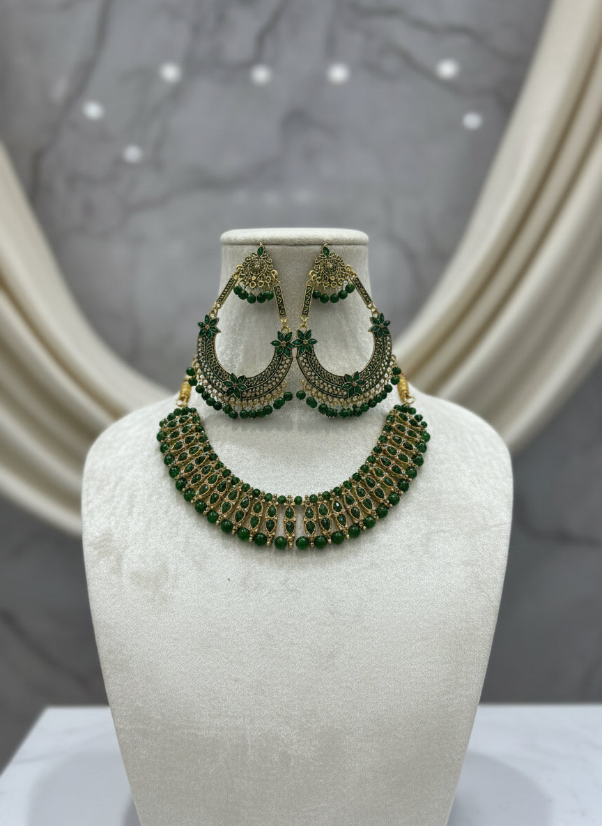 Party wear set. Green colour stones with golden plating chocker necklace and earrings in chand bali design. 