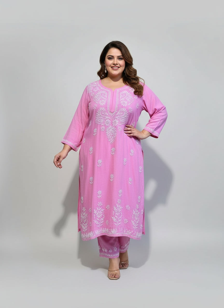 Pink colour rayon fabric plus size kurti and trousers with white thread chikankari embroidery on the kurti and trousers.