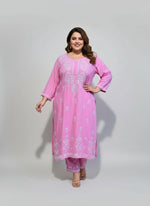 Pink colour rayon fabric plus size kurti and trousers with white thread chikankari embroidery on the kurti and trousers.