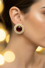 Posh maroon burgundy Mona Lisa stone stud earrings with nano pearl halo, ideal for traditional bridal jewellery and formal events.