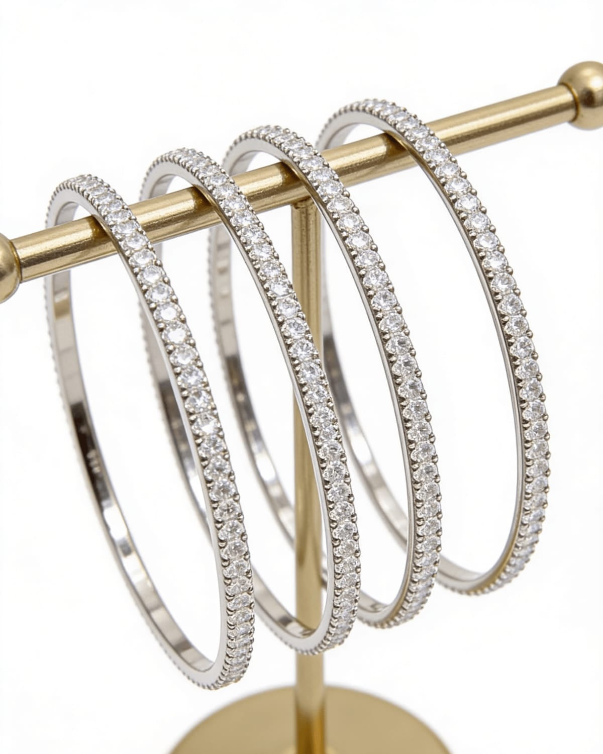 Stackable 4-piece American diamond bangle set in silver – slim eternity row design on female wrist – daily wear jewellery